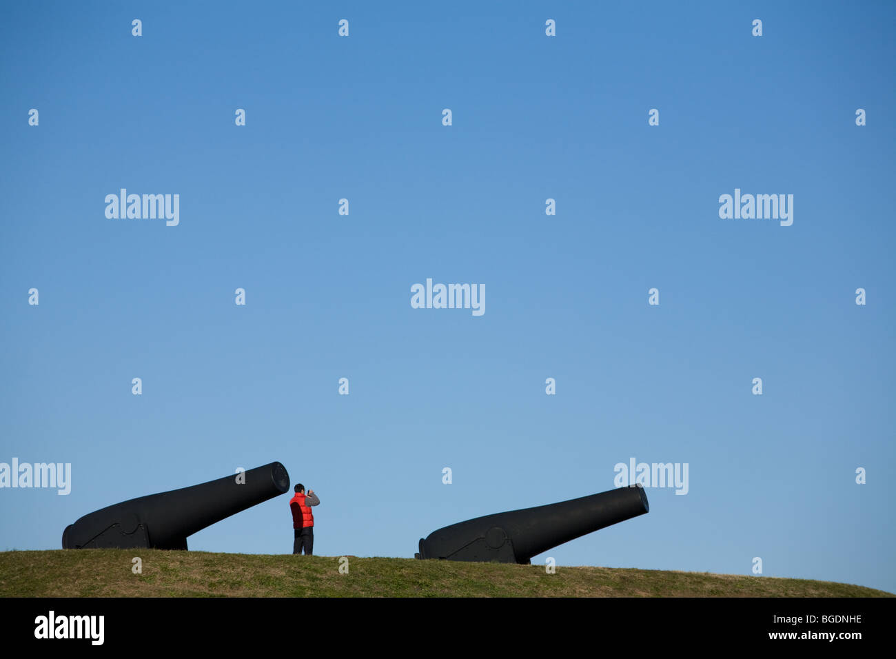 Cannon and tourist at Fort McHenry, Baltimore, Maryland Stock Photo