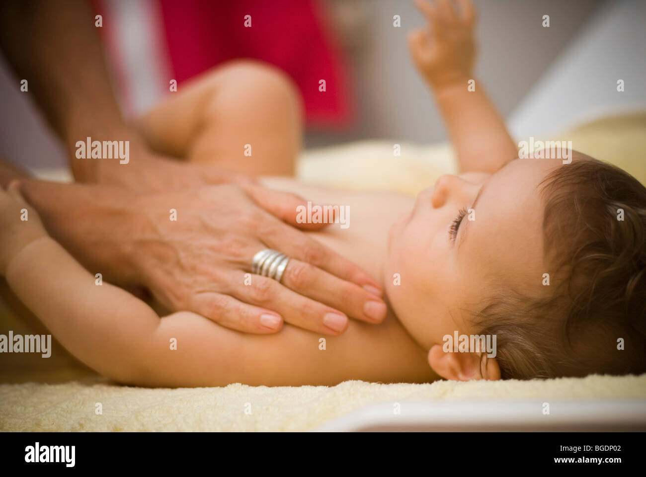 Mother caring for child Stock Photo