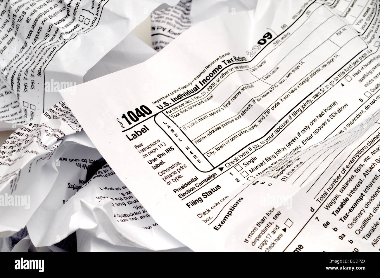 Crumpled 1040 income tax form Stock Photo