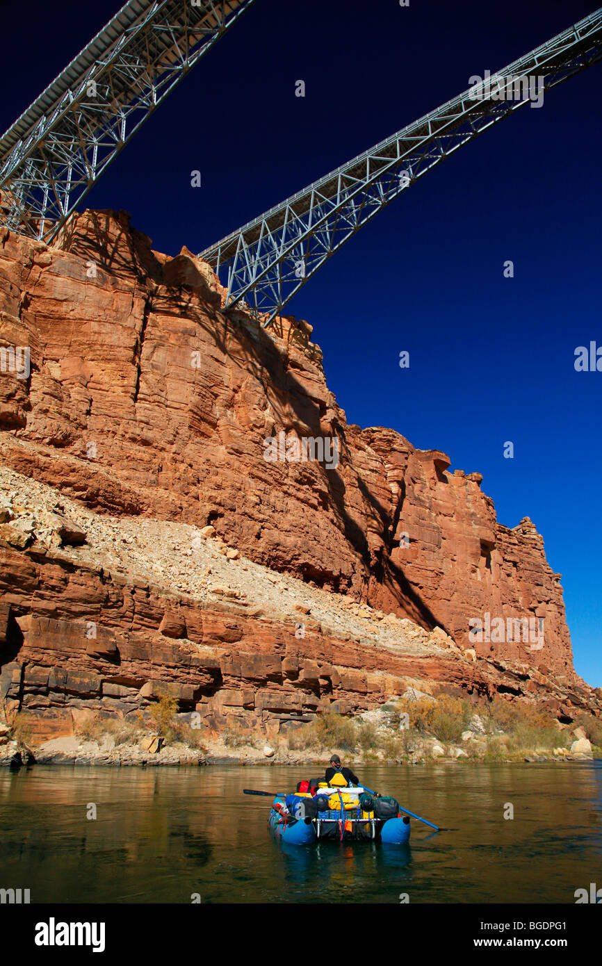 Wrapped Raft Bridge Winter whitewater raft expedition passes beneath the Navajo Bridges on ...