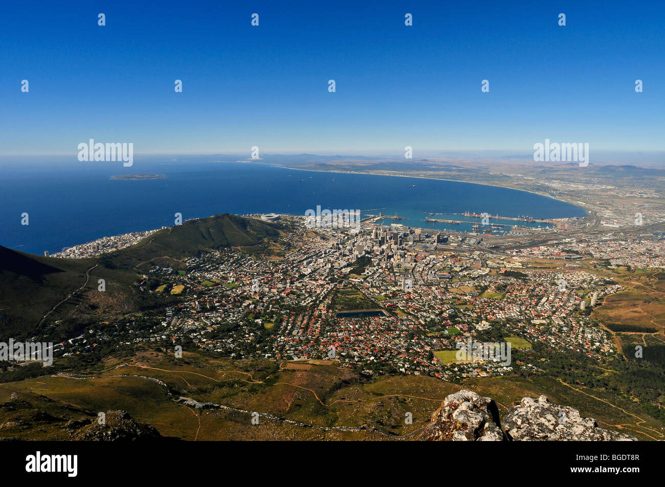 The view from Table Mountain overlooking the city of Cape Town and lions head in South Africa Stock Photo