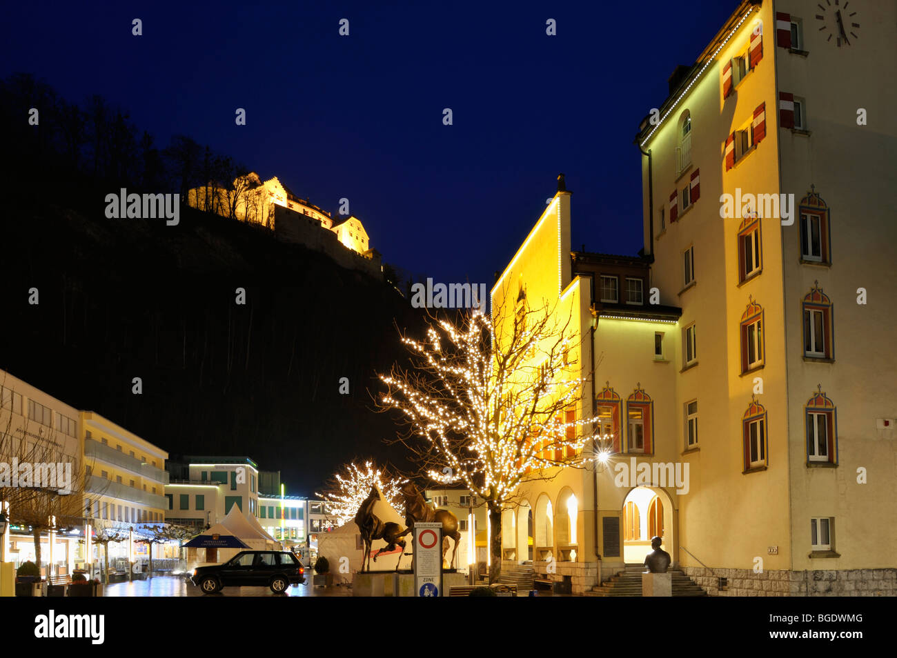 Downtown Städtle Vaduz with Princely Castle and Illuminated Townhall, Liechtenstein LI Stock Photo