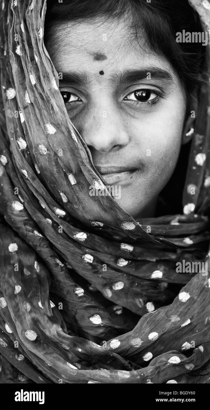 Smiling happy Indian girl wearing a shawl. Monochrome Stock Photo