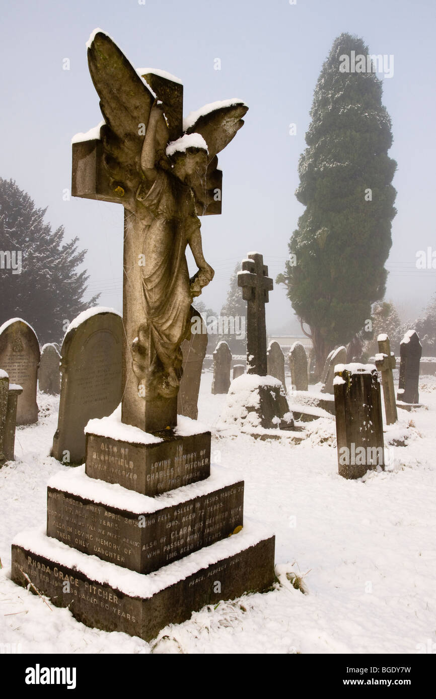 Gothic angel in snow Stock Photo