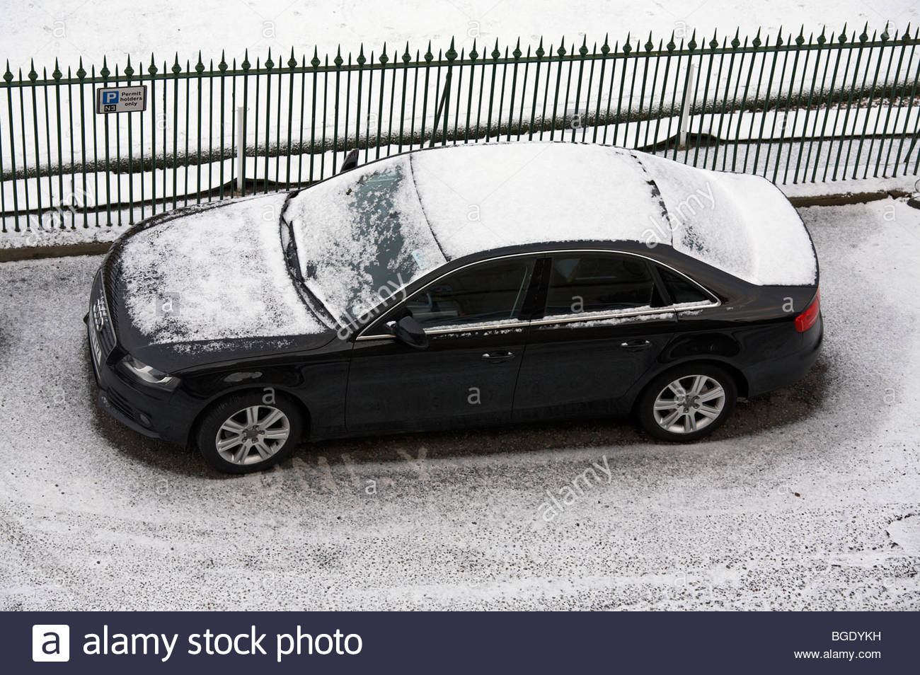 Parked car with dusting of snow Stock Photo