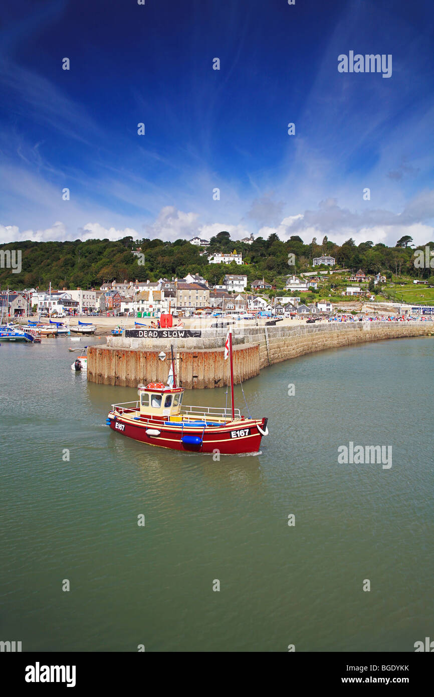 Pleasure boat taking holidaymakers on fishing trip from Lyme Regis harbour Stock Photo