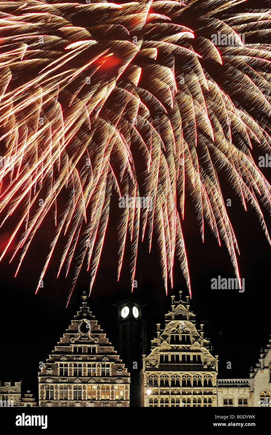 Colourful fireworks at night above the mediaeval façades at the Graslei, Ghent, Belgium Digital composite Stock Photo
