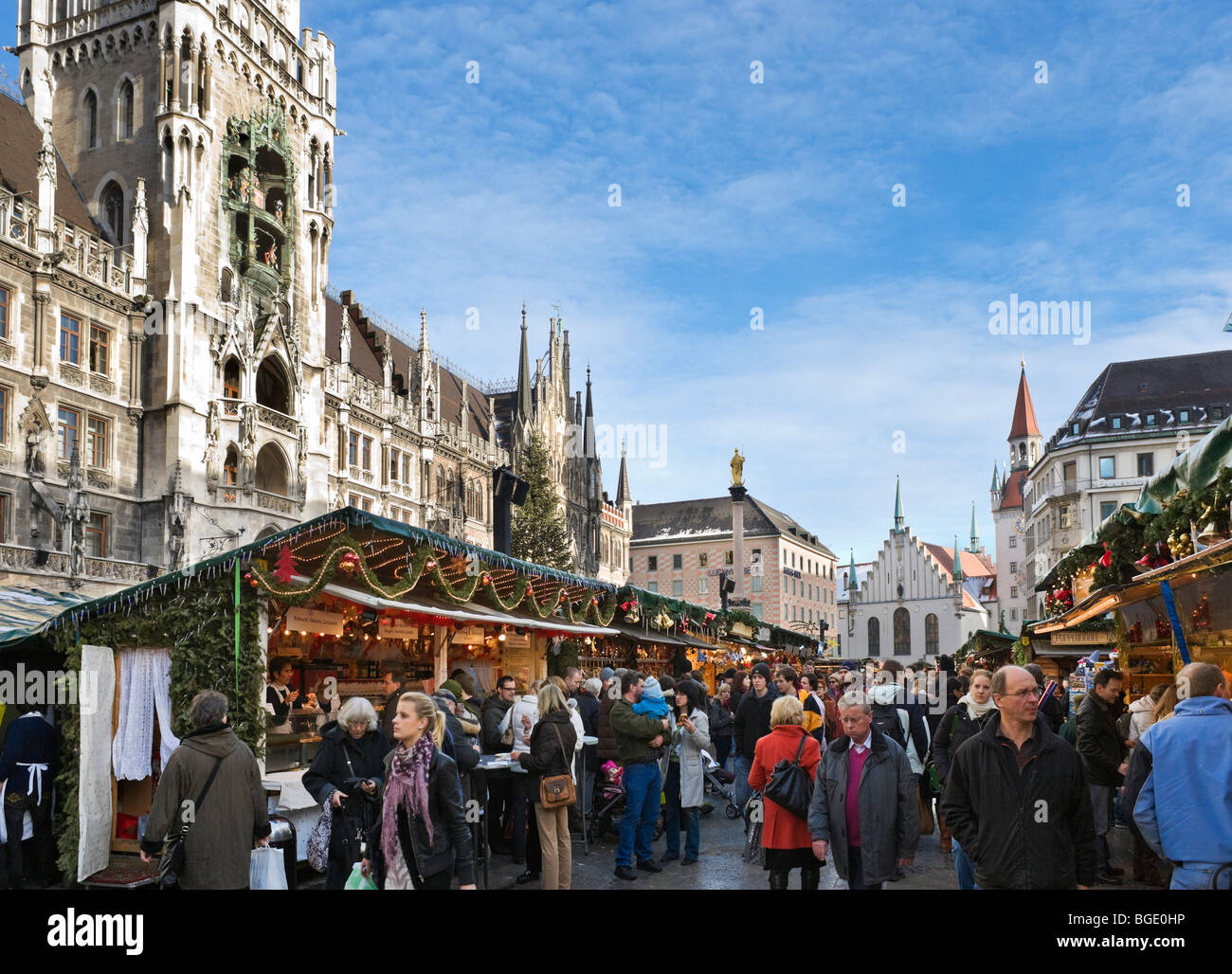 Christmas Market in Marienplatz with the New Town Hall to the left and the Old Town Hall behind, Munich, Germany Stock Photo