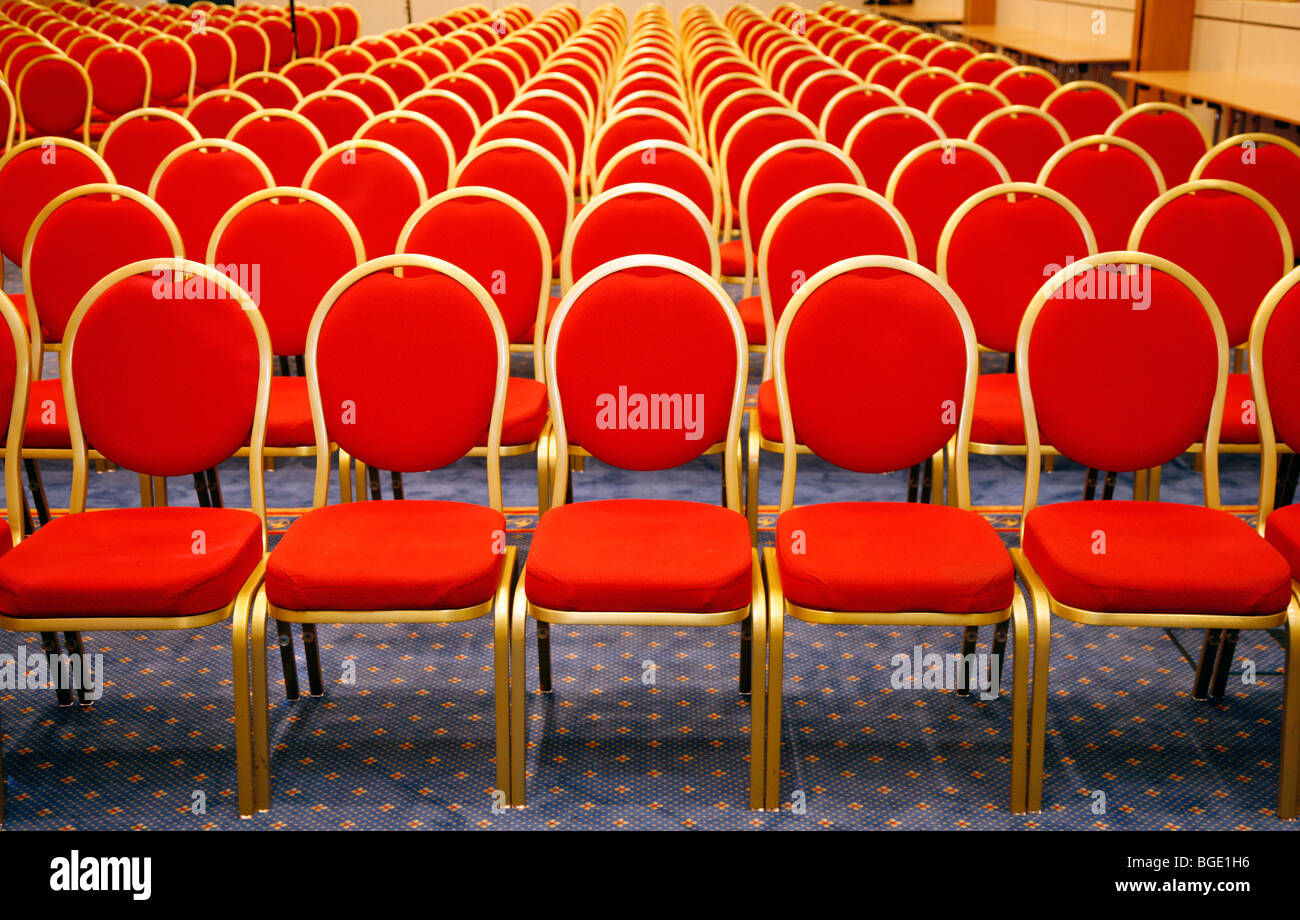 conference hall with red chairs in rows Stock Photo - Alamy