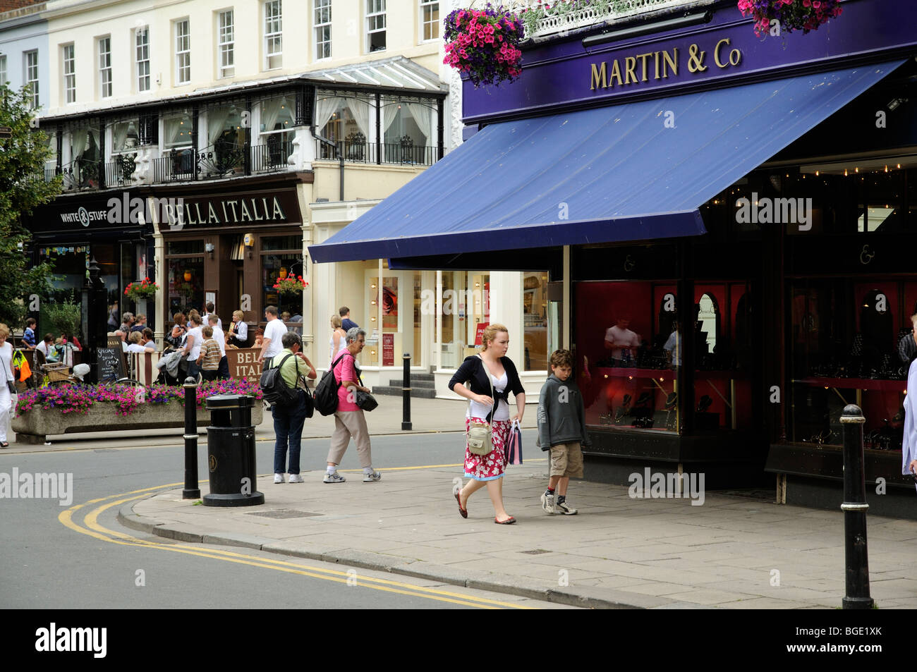 Shoppers in Cheltenham town centre Gloucestershire England UK Stock