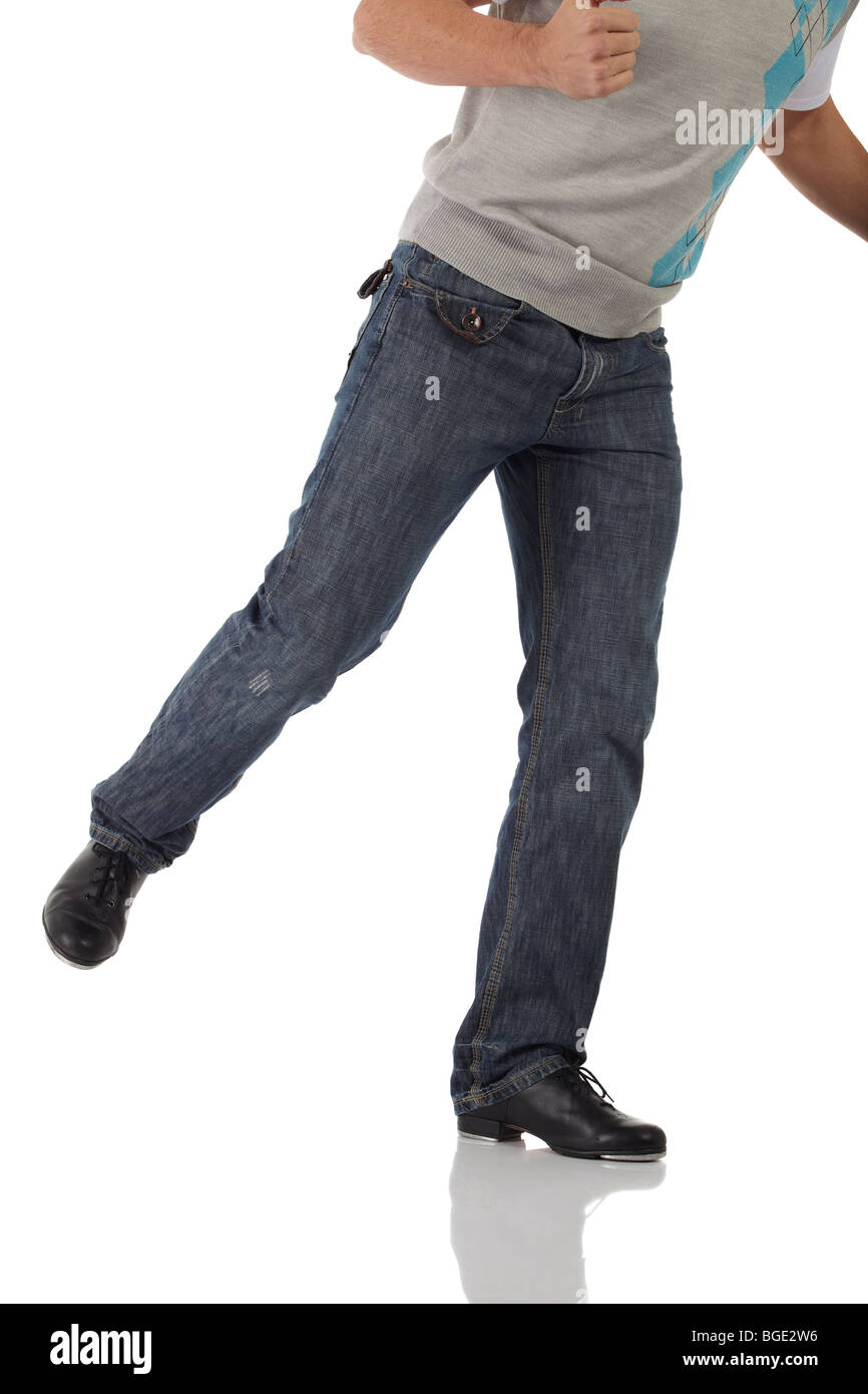 Single male tap dancer wearing jeans showing various steps in studio