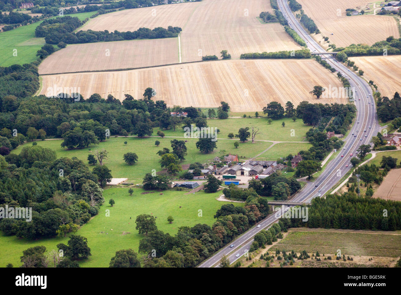 aerial view of the A14 road in Suffolk, UK also showing the Rougham Estate Farm Stock Photo