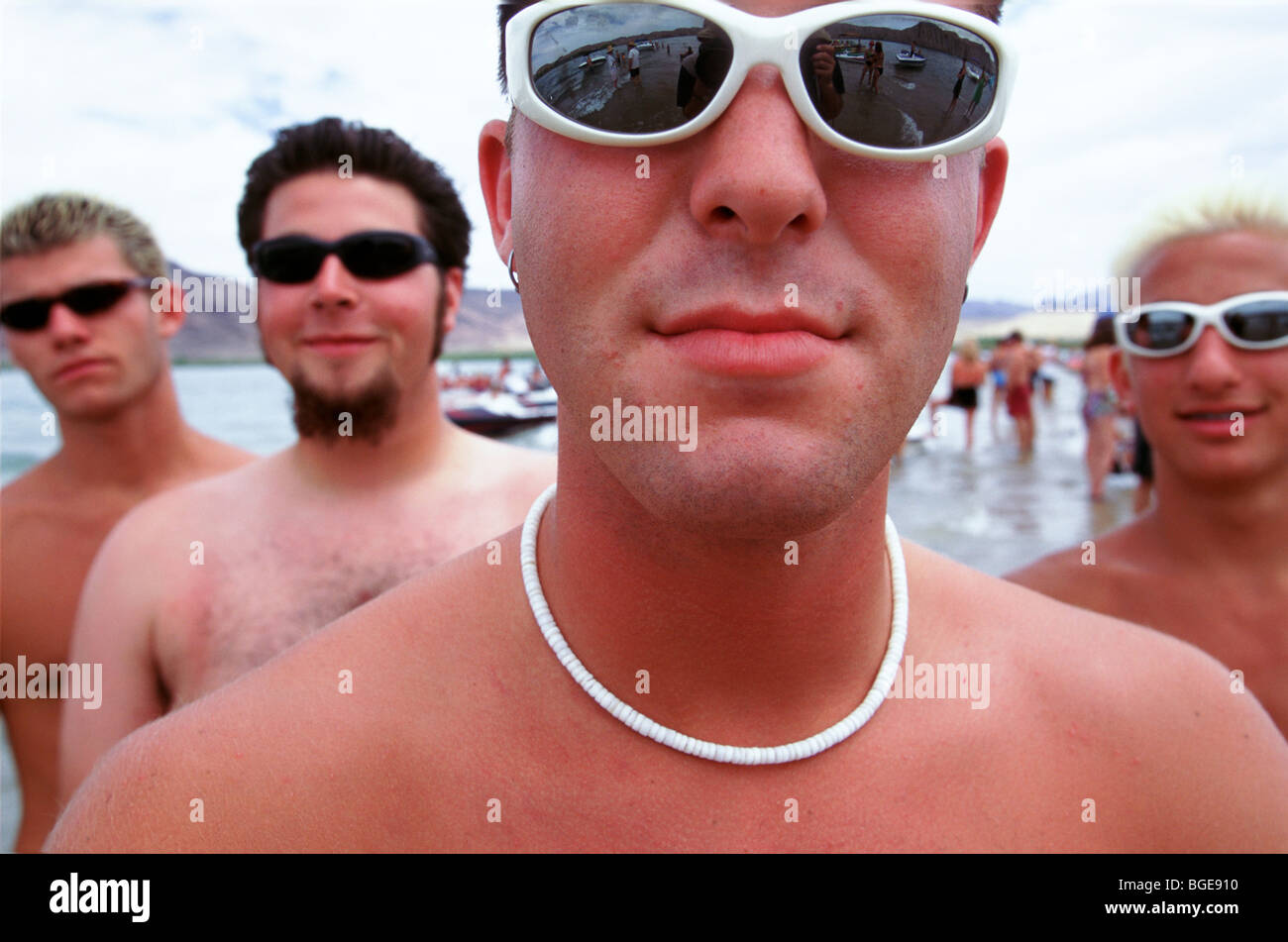 A group of men wearing sunglasses at Lake Havasu, Arizona, USA Stock Photo