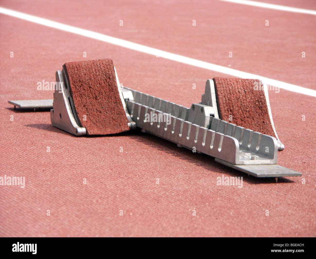 Shot of starting blocks on racing track Stock Photo Alamy