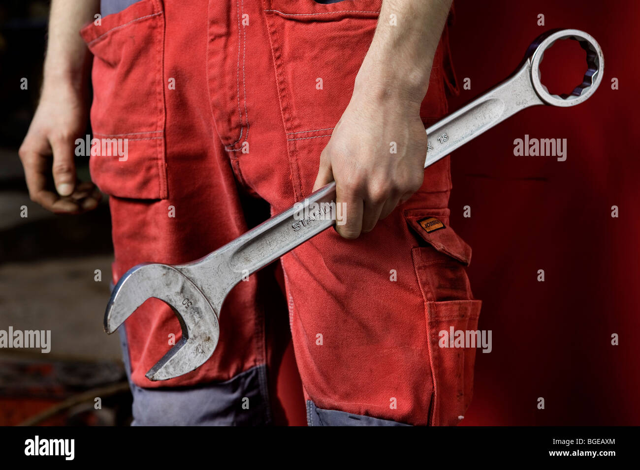 Man with a doubleended spanner Stock Photo Alamy