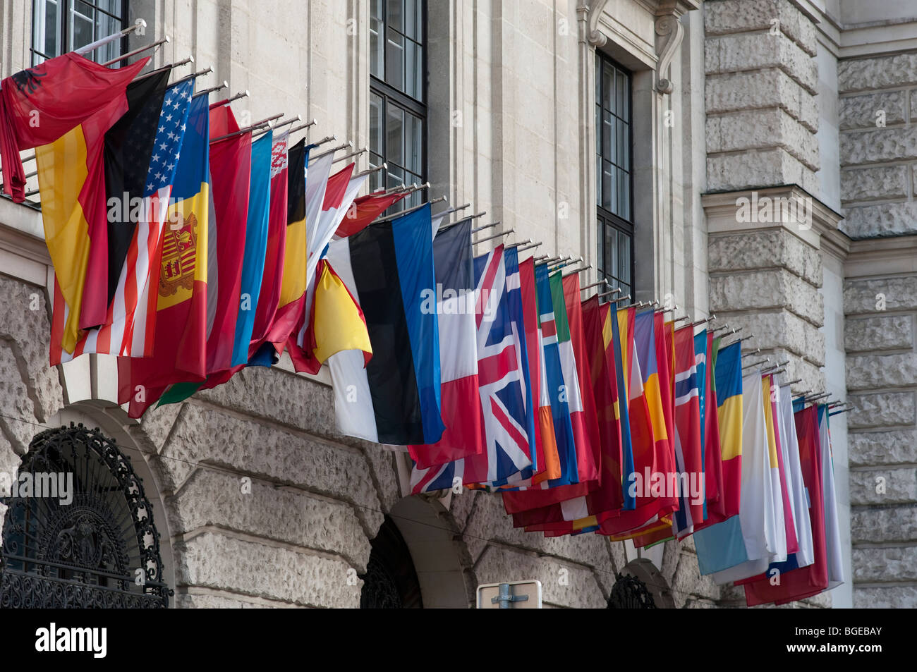 flags of many nations on a building in historic Heldenplatz, Vienna, Austria Stock Photo