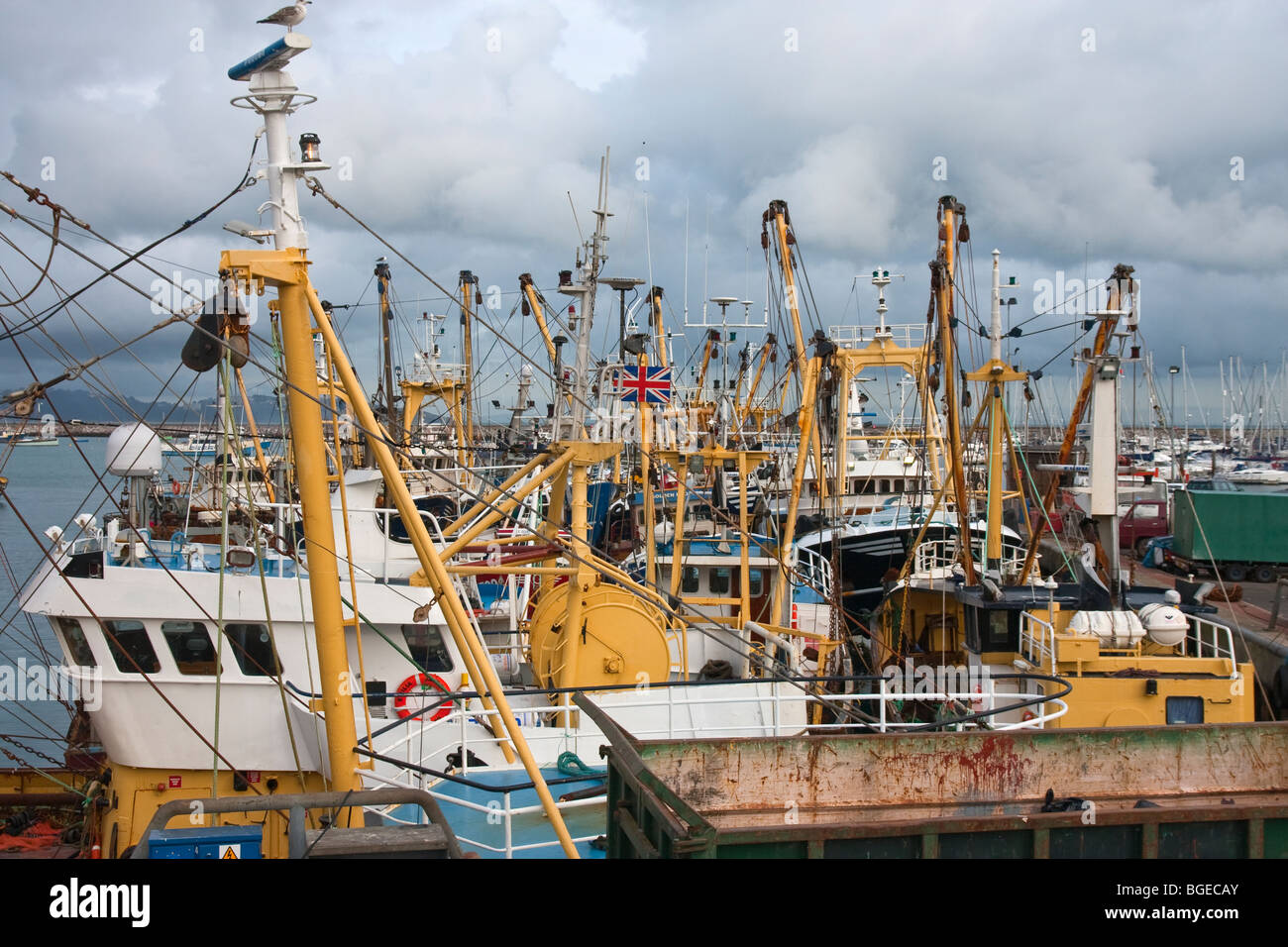 Fishing trawlers moored up in 'Brixham harbour' Stock Photo