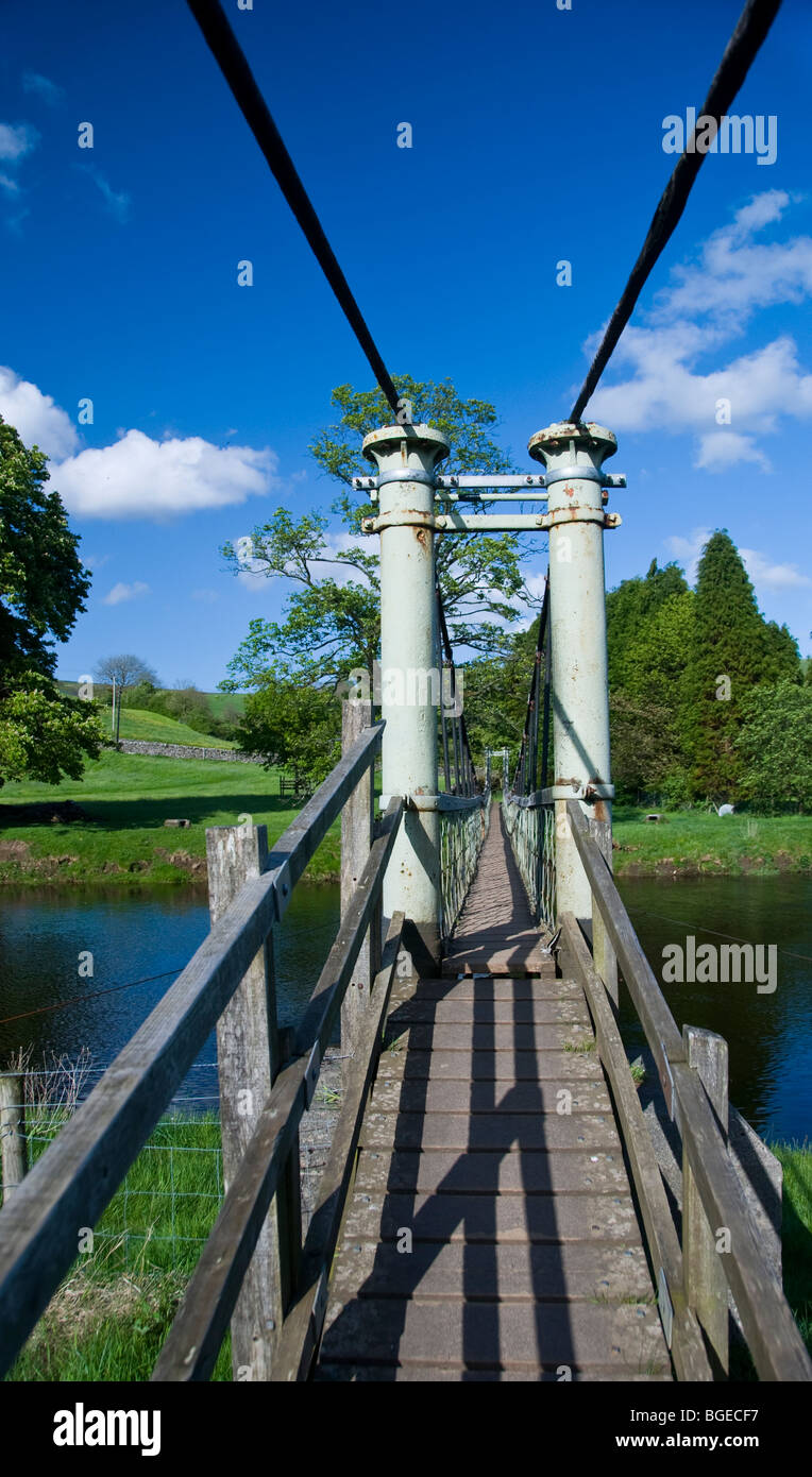 Suspension Bridge on the Dales Way Long Distance Path at Hebden Bridge in the Pennines. Stock Photo