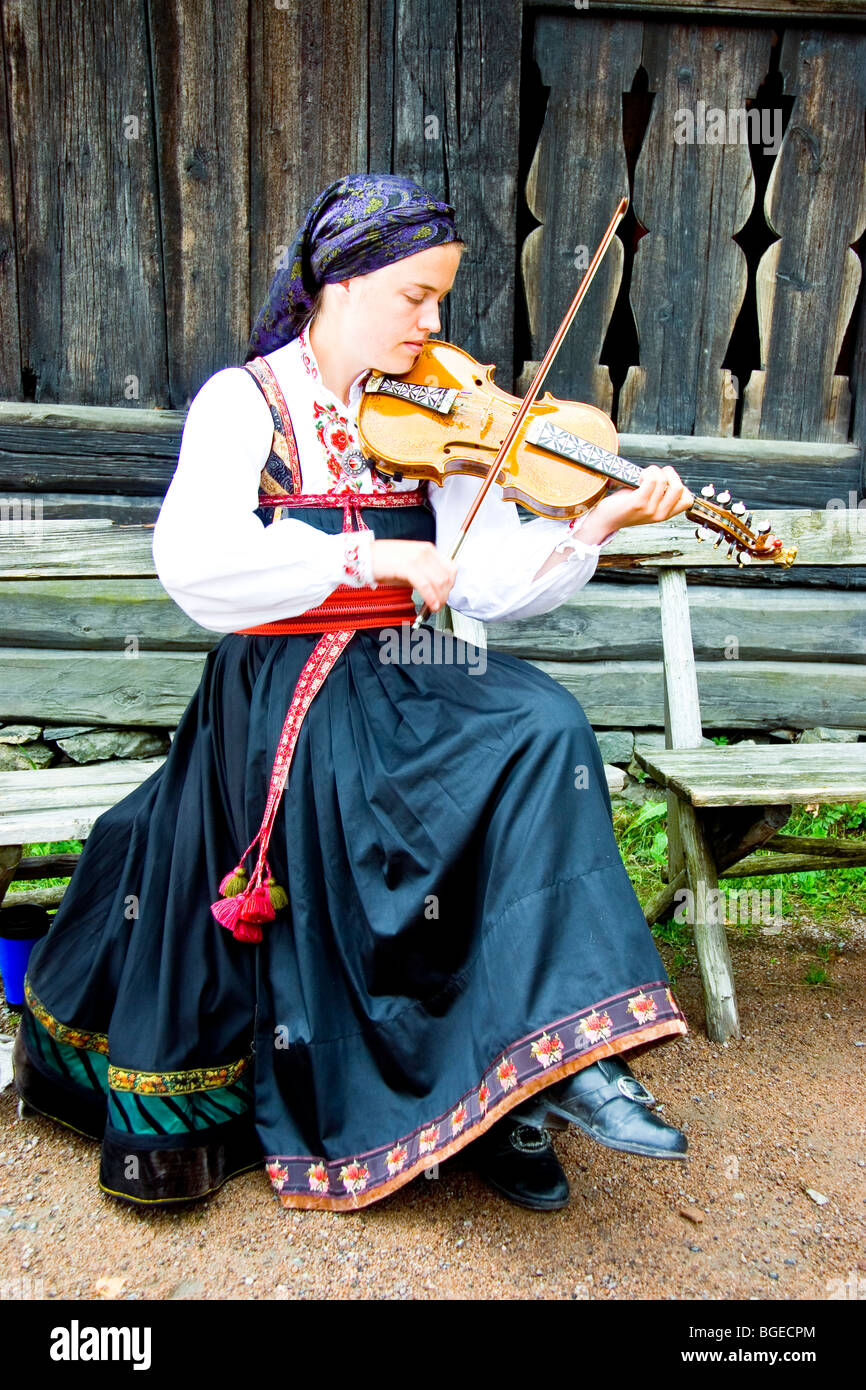 Costumed interpreters perform folk music and dancing at the open-air Norwegian Museum of Cultural History Oslo Norway Stock Photo