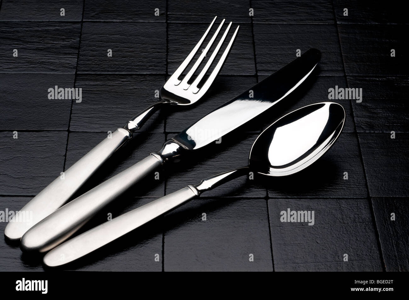 Serving ware on a black place mat Stock Photo Alamy