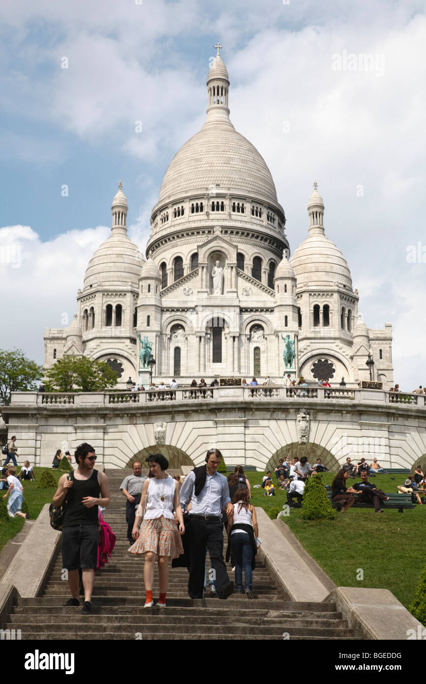 Tourists enjoy the gardens at Sacre Coeur in Montmartre, Paris, France Stock Photo