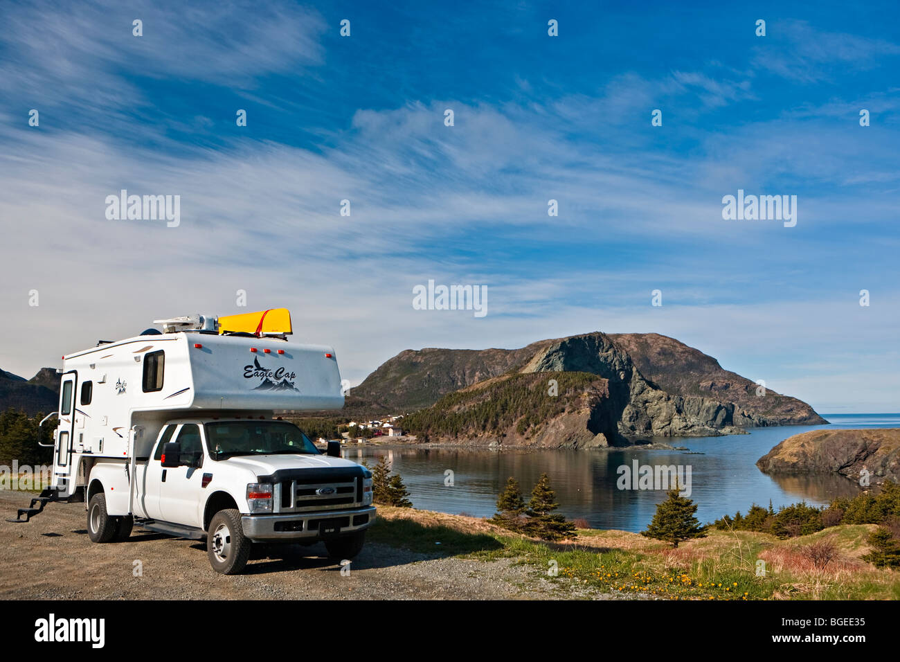 Camper parked an open area in Bottle Cove at the end of the Humber Arm near Lark Harbour, Canada., Newfoundland Stock Photo