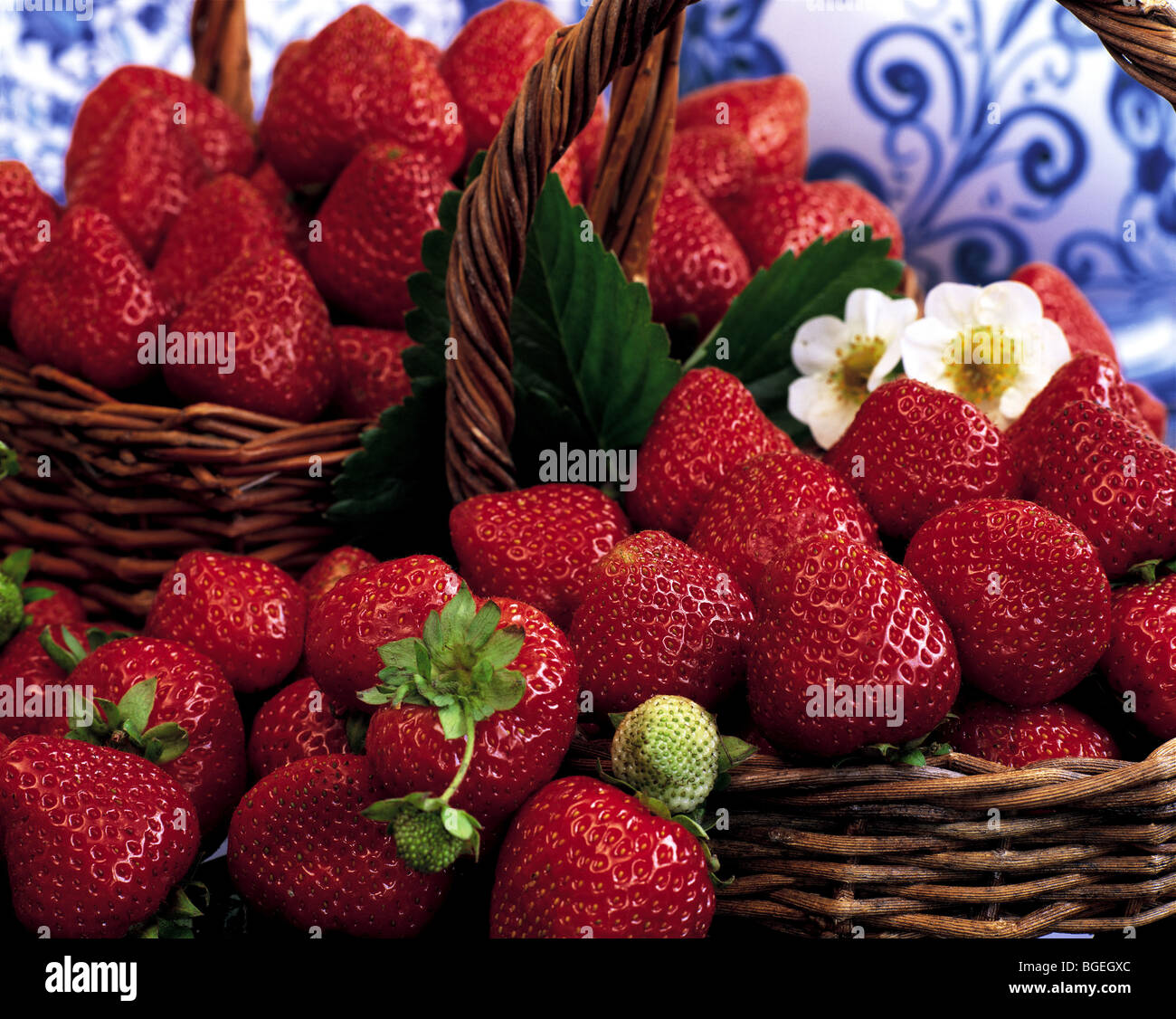 Strawberries in basket Stock Photo - Alamy