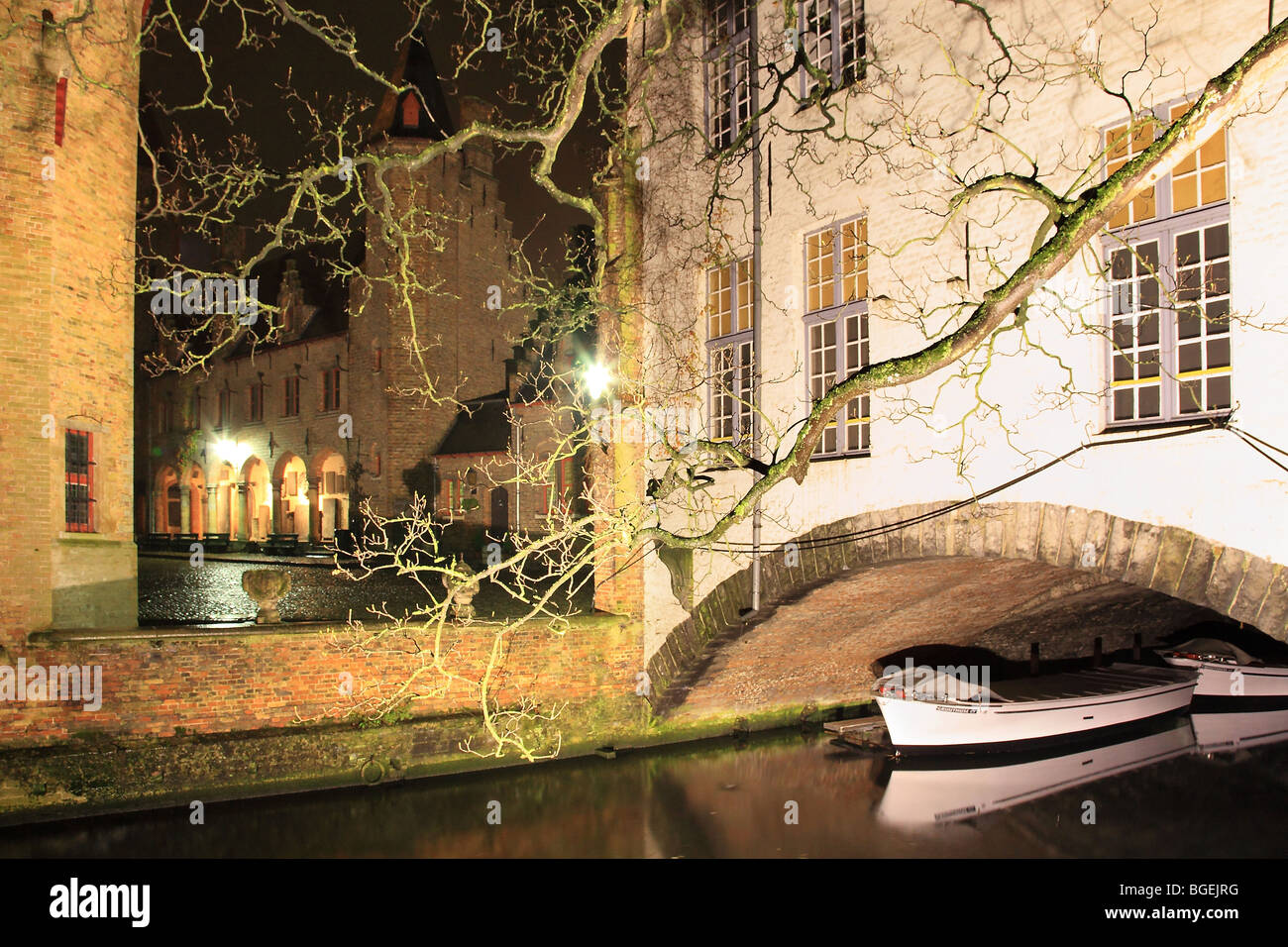 Gruuthuse Museum and Canal by night in Bruges Brugge Belgium Stock Photo