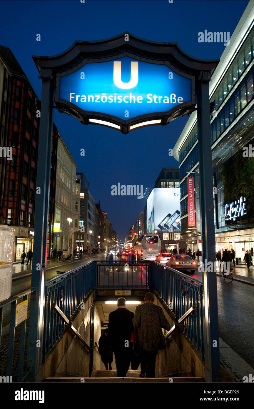 View of Friedrichstrasse at night at entrance to Franzosische Strasse subway ststion in Mitte Berlin Germany Stock Photo