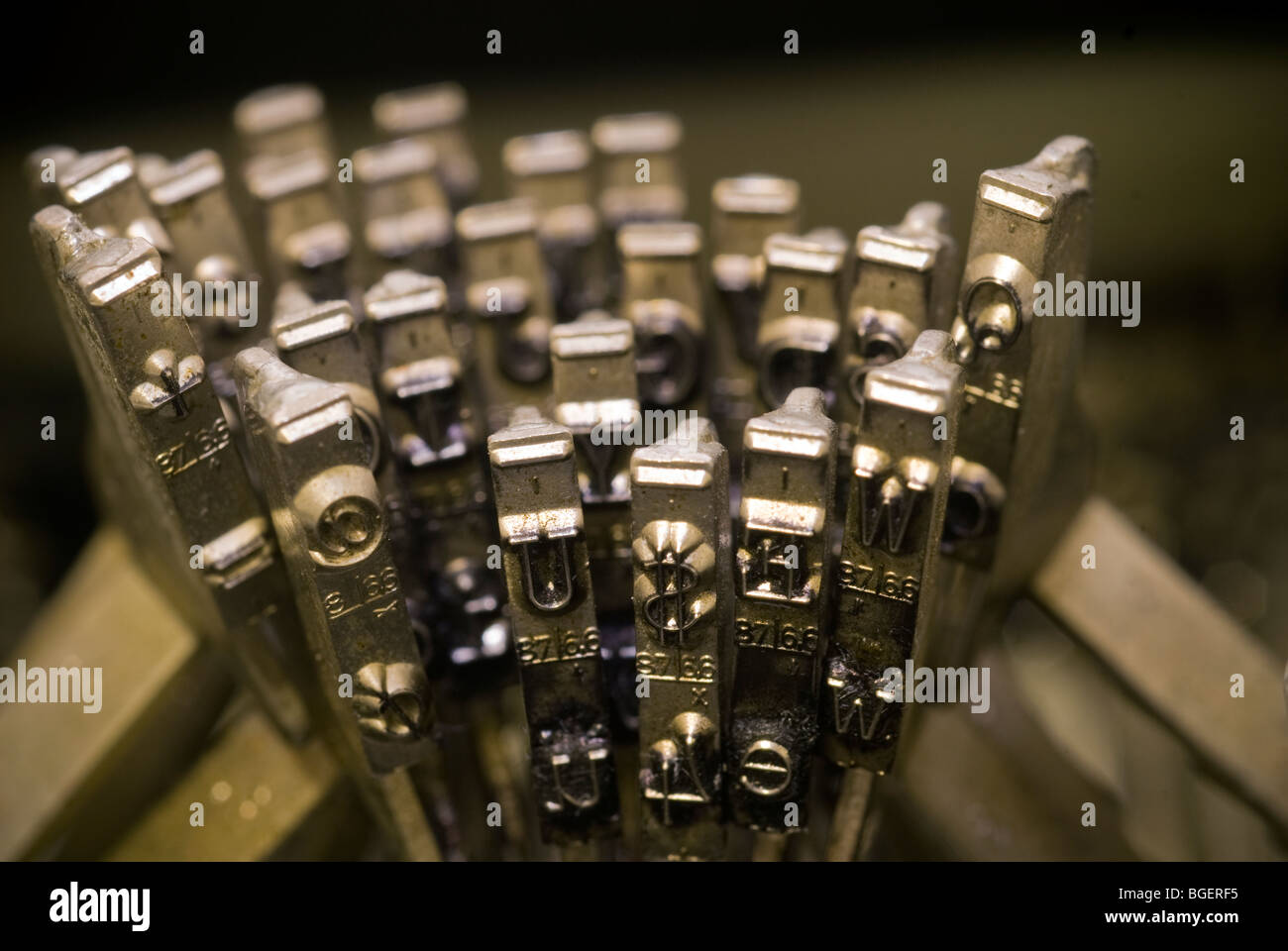 Jammed up typewriter keys including a dollar sign are seen on an old