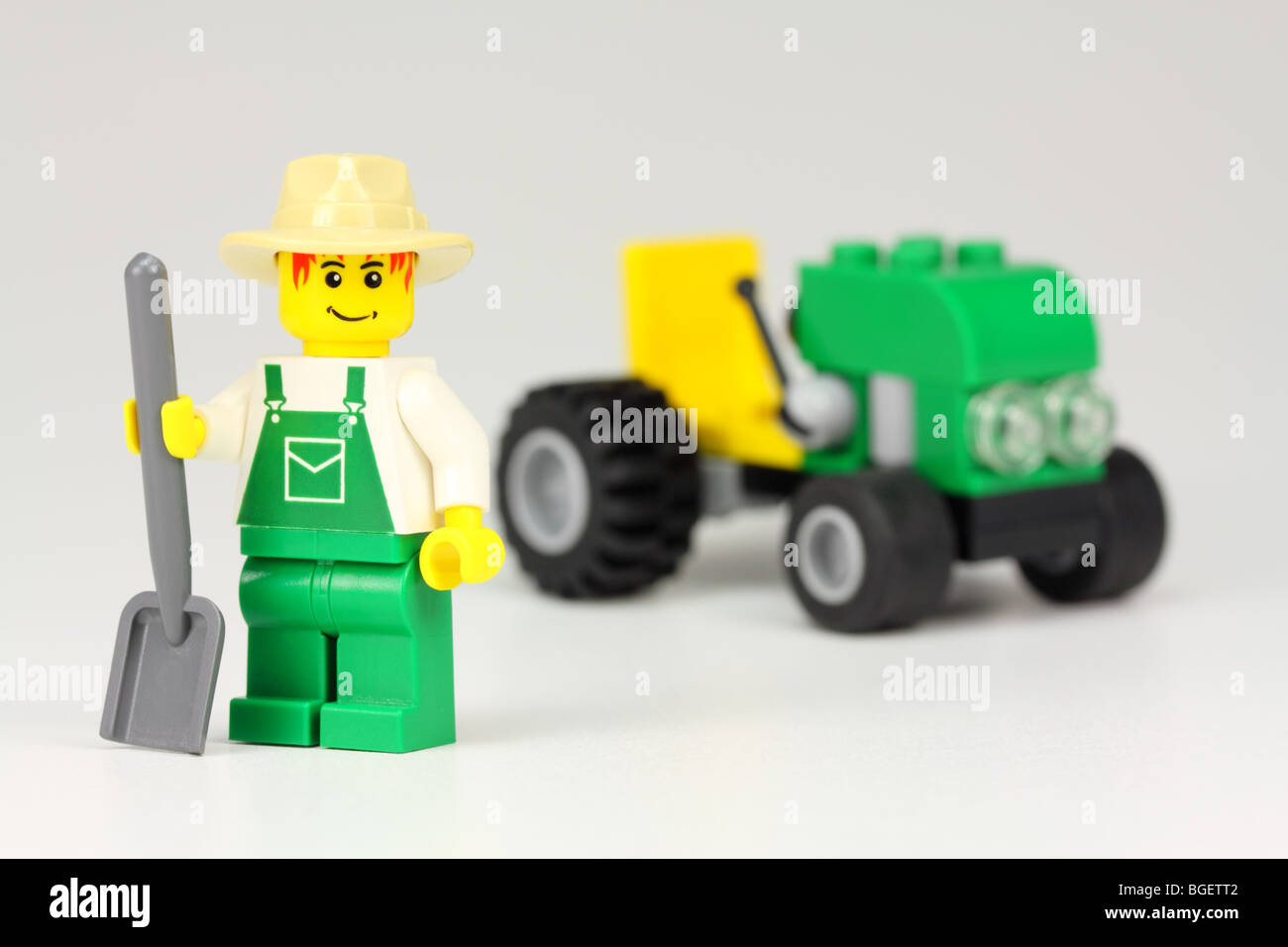 Lego farmer with tractor Stock Photo