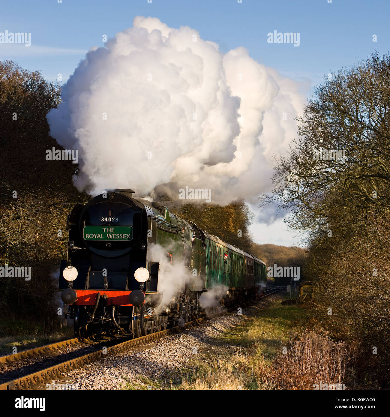 34028 Eddystone approaches Harmans Cross on the Swanage Railway, Dorset with a 'Royal Wessex' christmas dining train Stock Photo