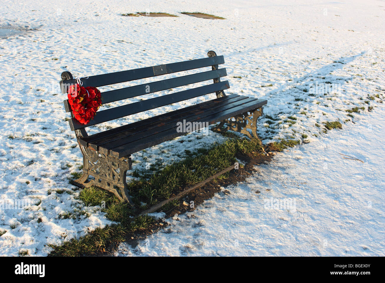 A wreath placed upon a memorial bench in Whitburn, Tyne and Wear, England Stock Photo