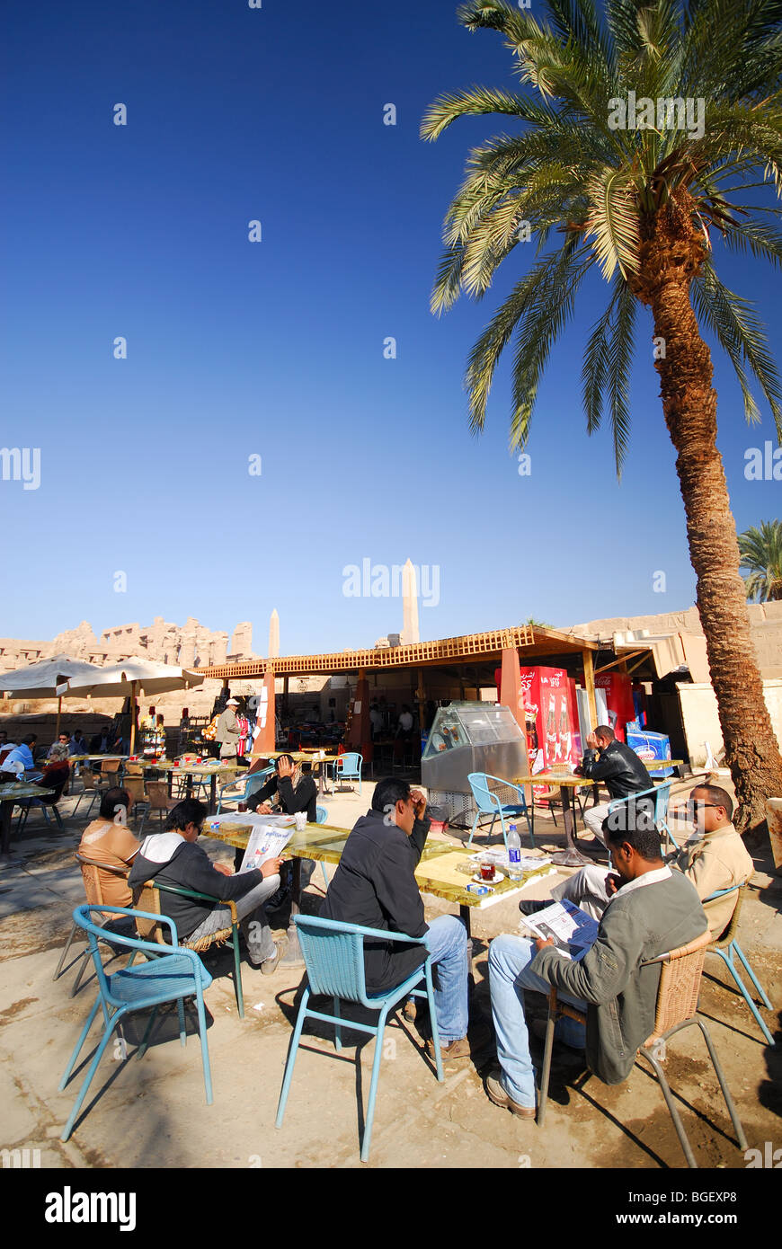 LUXOR, EGYPT. Egyptian men at a cafe at Karnak Temple. Stock Photo