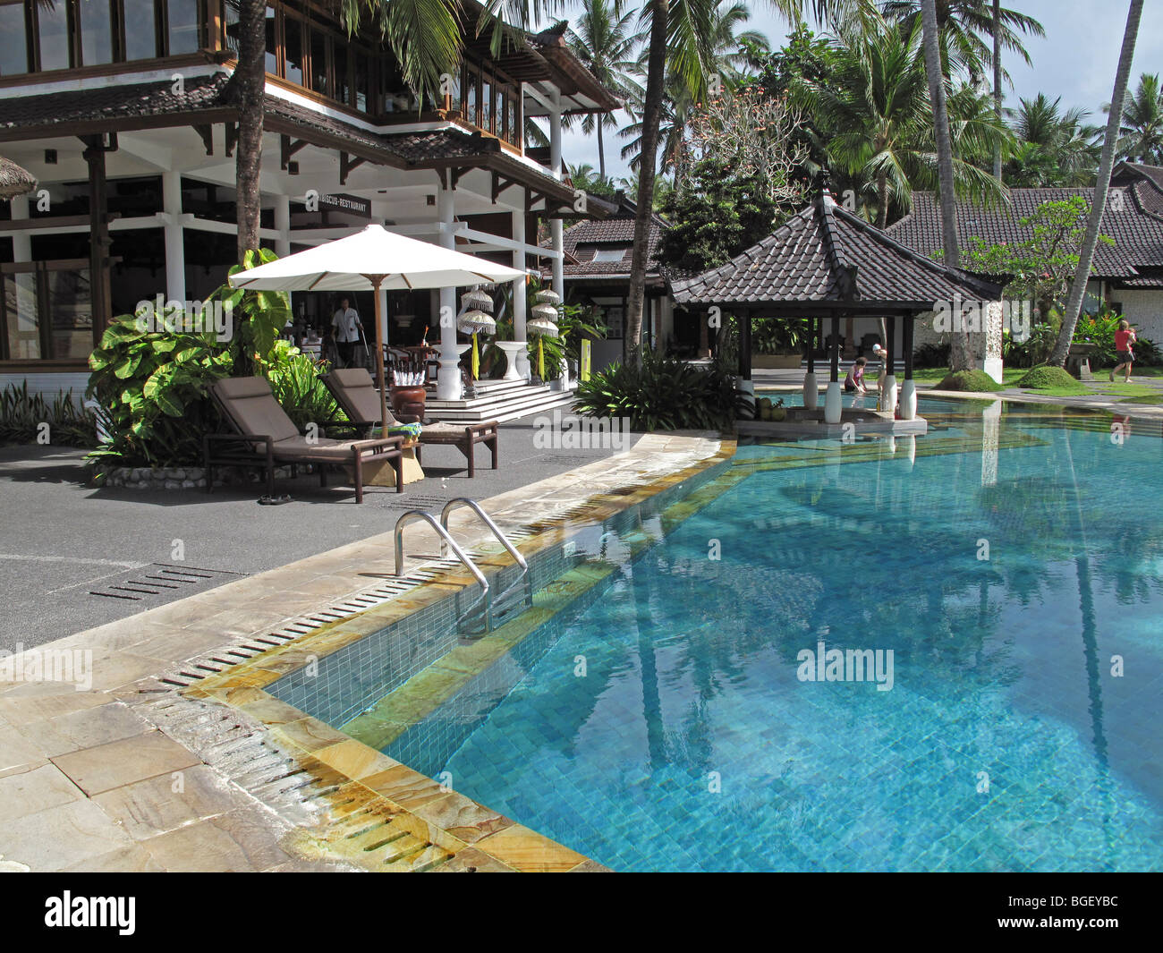 Swimming pool in Candi Beach Cottage at Candidasa, Karangasem, Bali, Indonesia Stock Photo