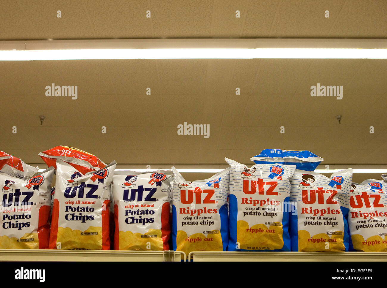 Potato chips on display in a grocery store.  Stock Photo