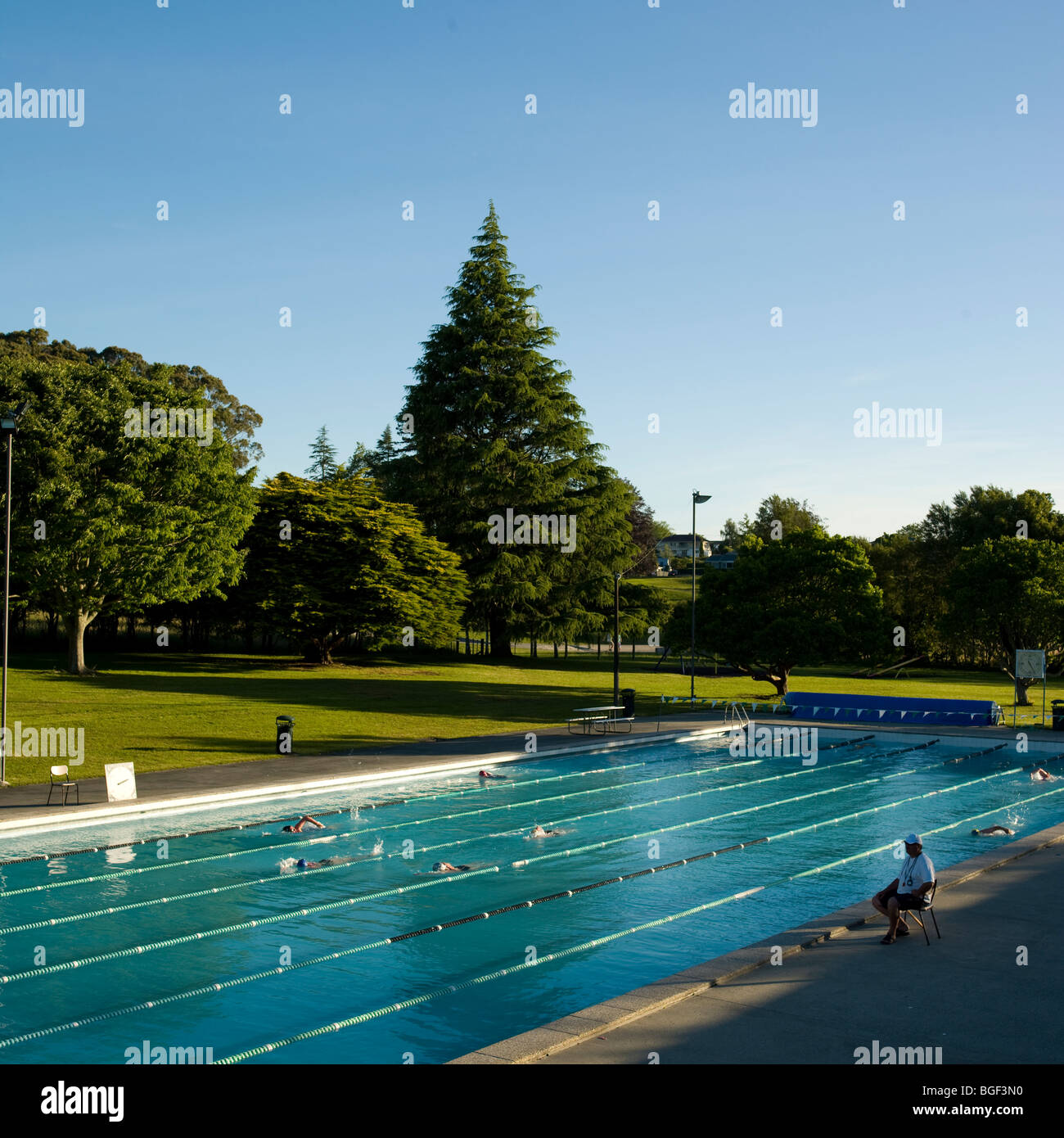 Senior adults swimming at Cambridge swimming pool Stock Photo