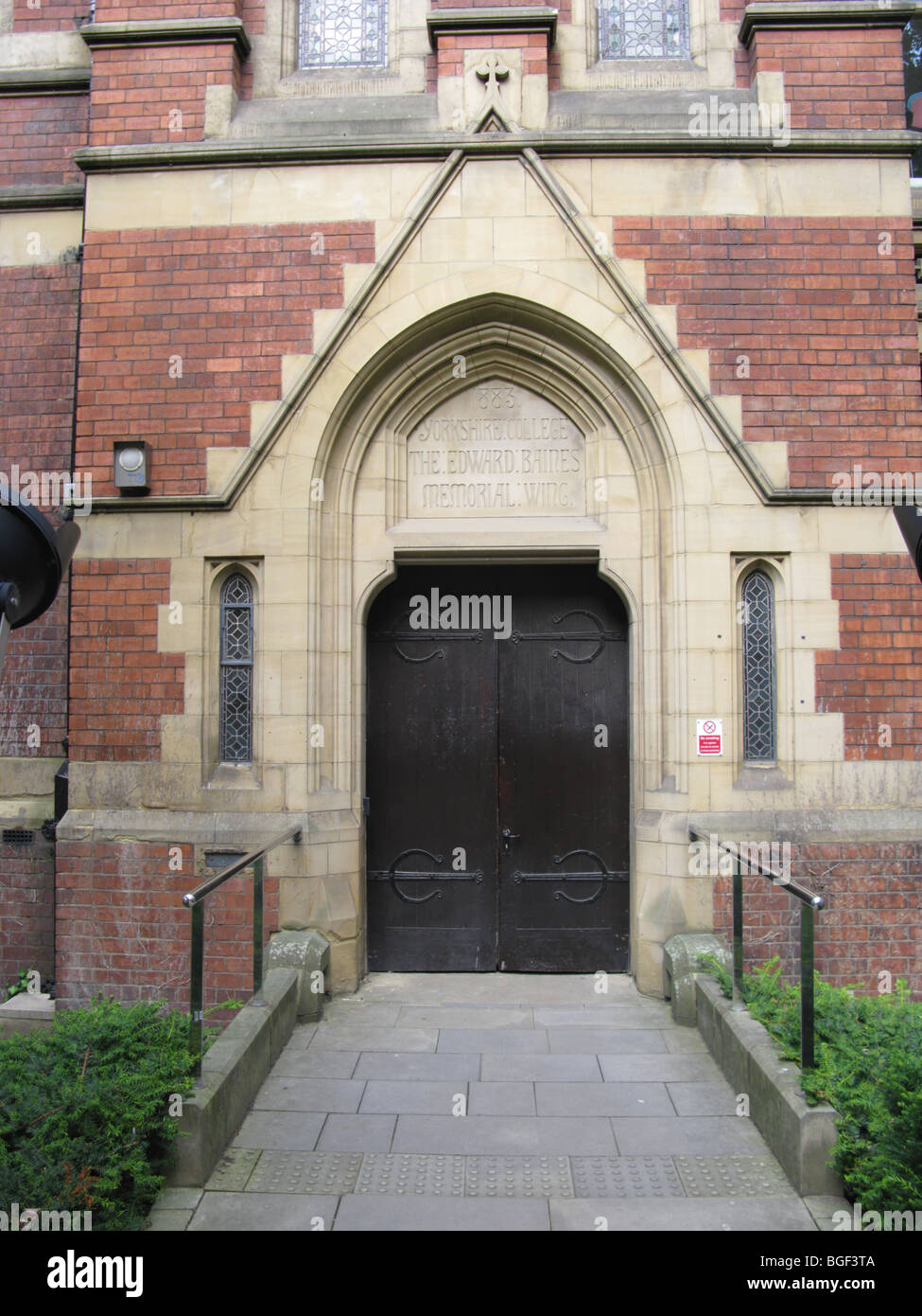 leeds university entrance to baines memorial wing  uk red brick redbrick door doorway arts and crafts movement Stock Photo