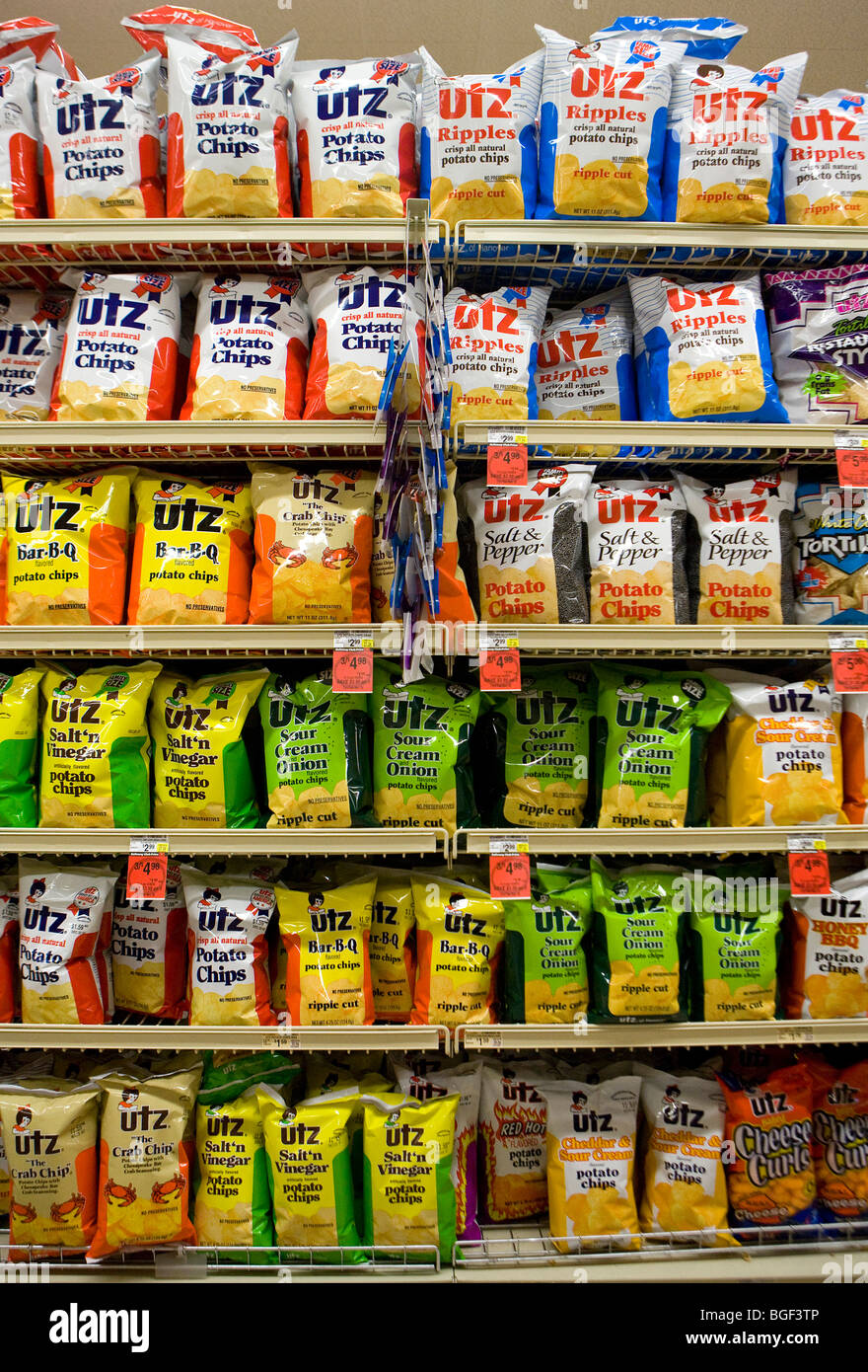 Potato chips on display in a grocery store.  Stock Photo