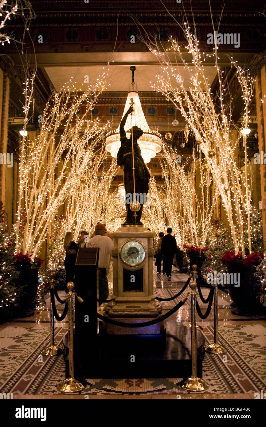 Roosevelt Hotel lobby with antique perpetual clock and Christmas lights. New Orleans, LA, USA. Stock Photo