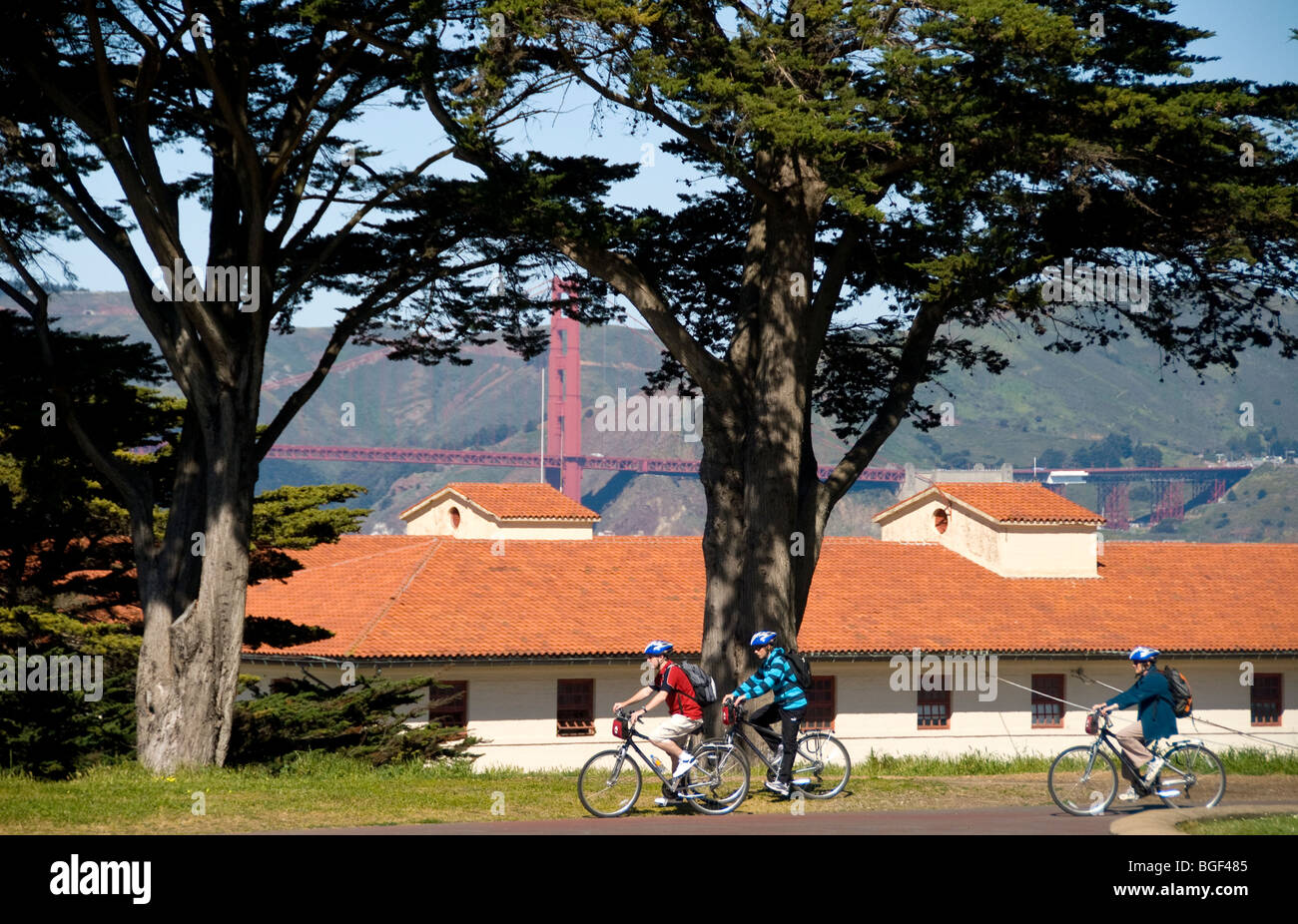 Bicyclists riding on trail adjacent to the Great Meadow, Fort Mason Center, San Francisco, California Stock Photo