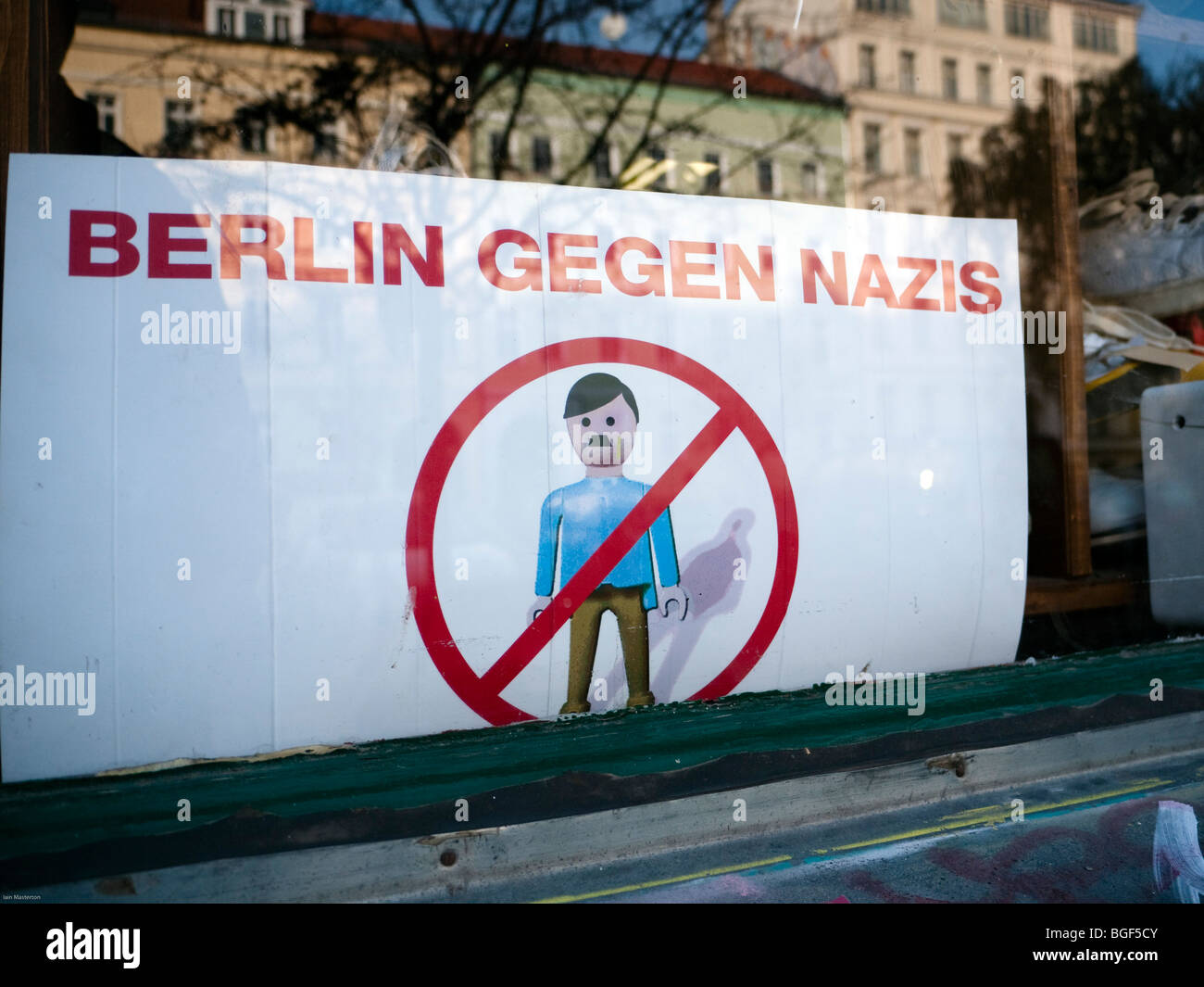 Anti Nazi sign in shop window in bohemian district of Prenzlauer Berg in Berlin Germany Stock Photo