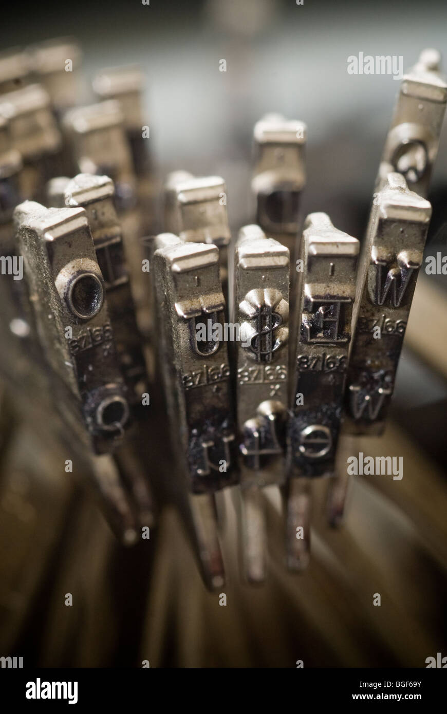 Jammed up typewriter keys including a dollar sign are seen on an old