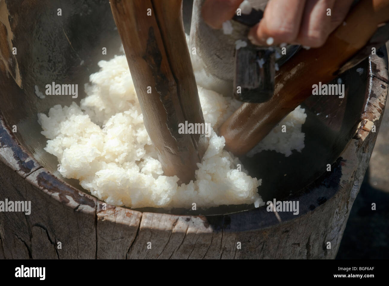 Mochi pounding of hot rice. Stock Photo