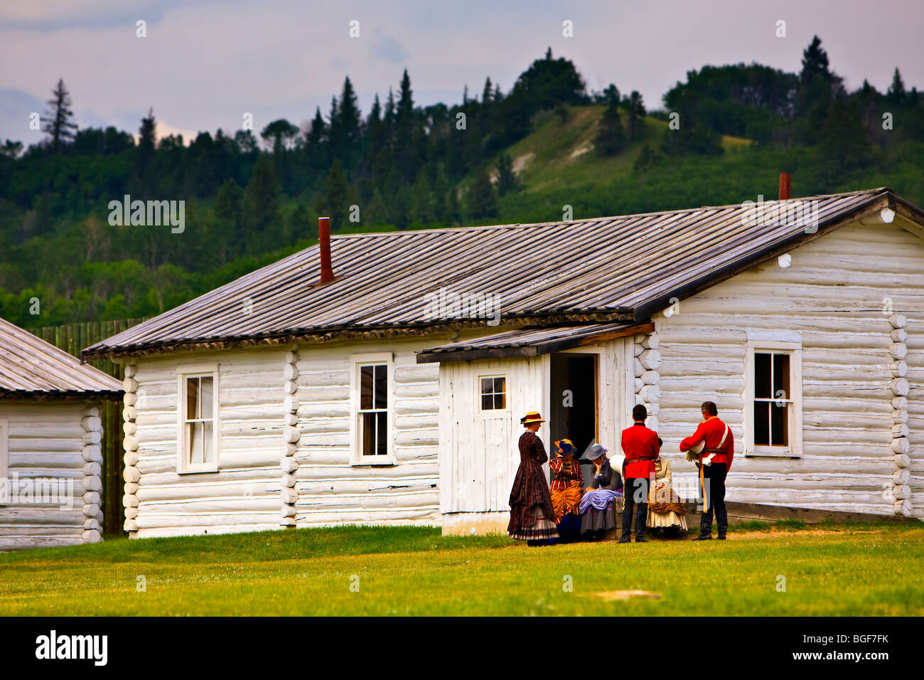Costumed interpreters gathered outside a building at Fort Walsh National Historic Site, Cypress Hills Interprovincial Park, Sask Stock Photo