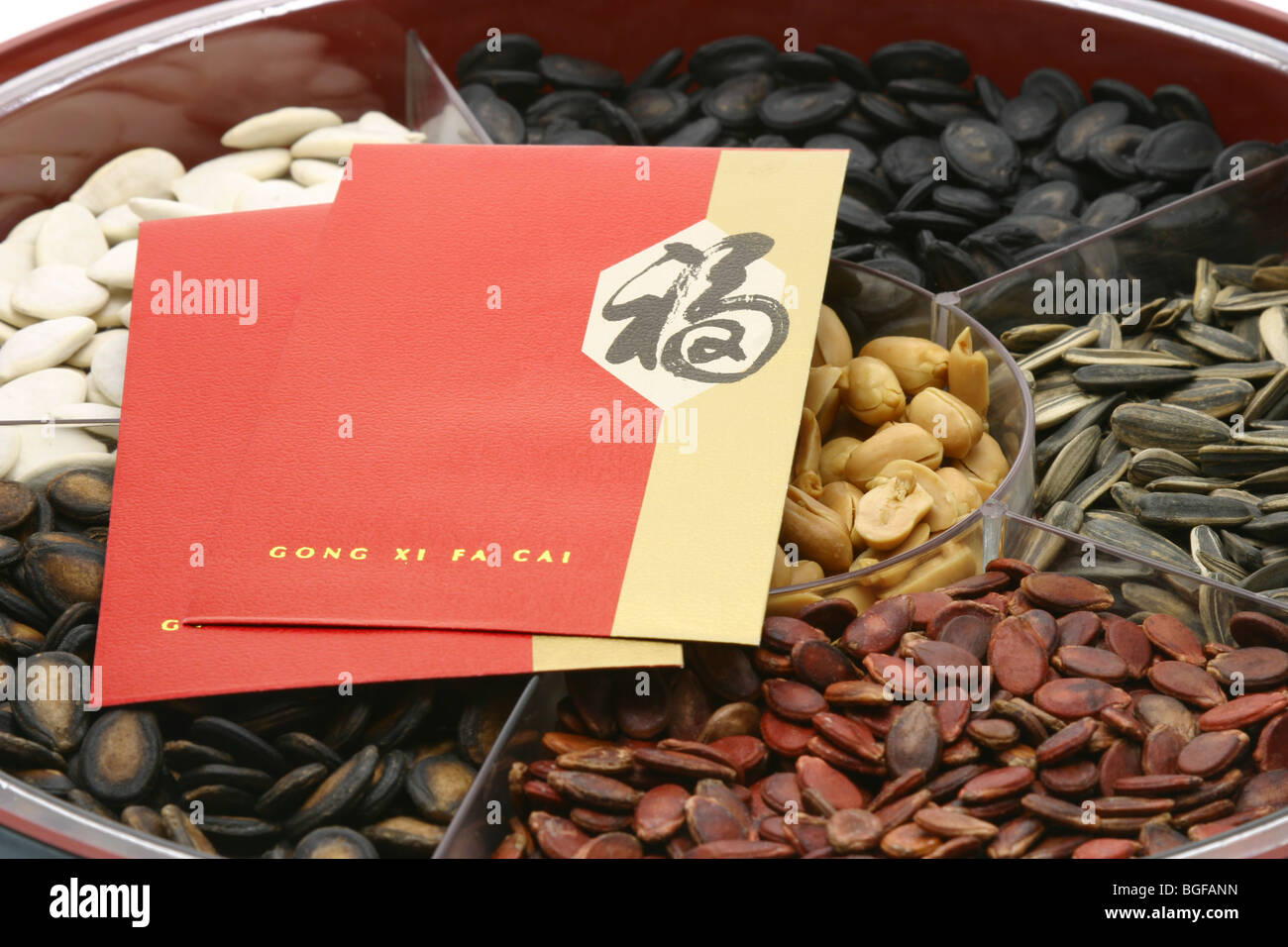 chinese-new-year-red-packets-on-snacks-tray-on-white-BGFANN.jpg