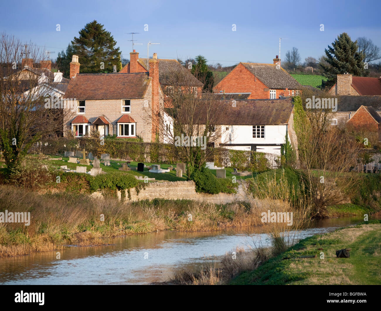 village with houses in countryside the river avon passing through