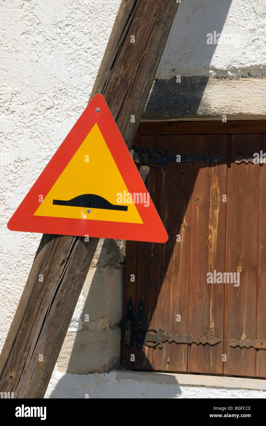 Road sign in Greek village Stock Photo