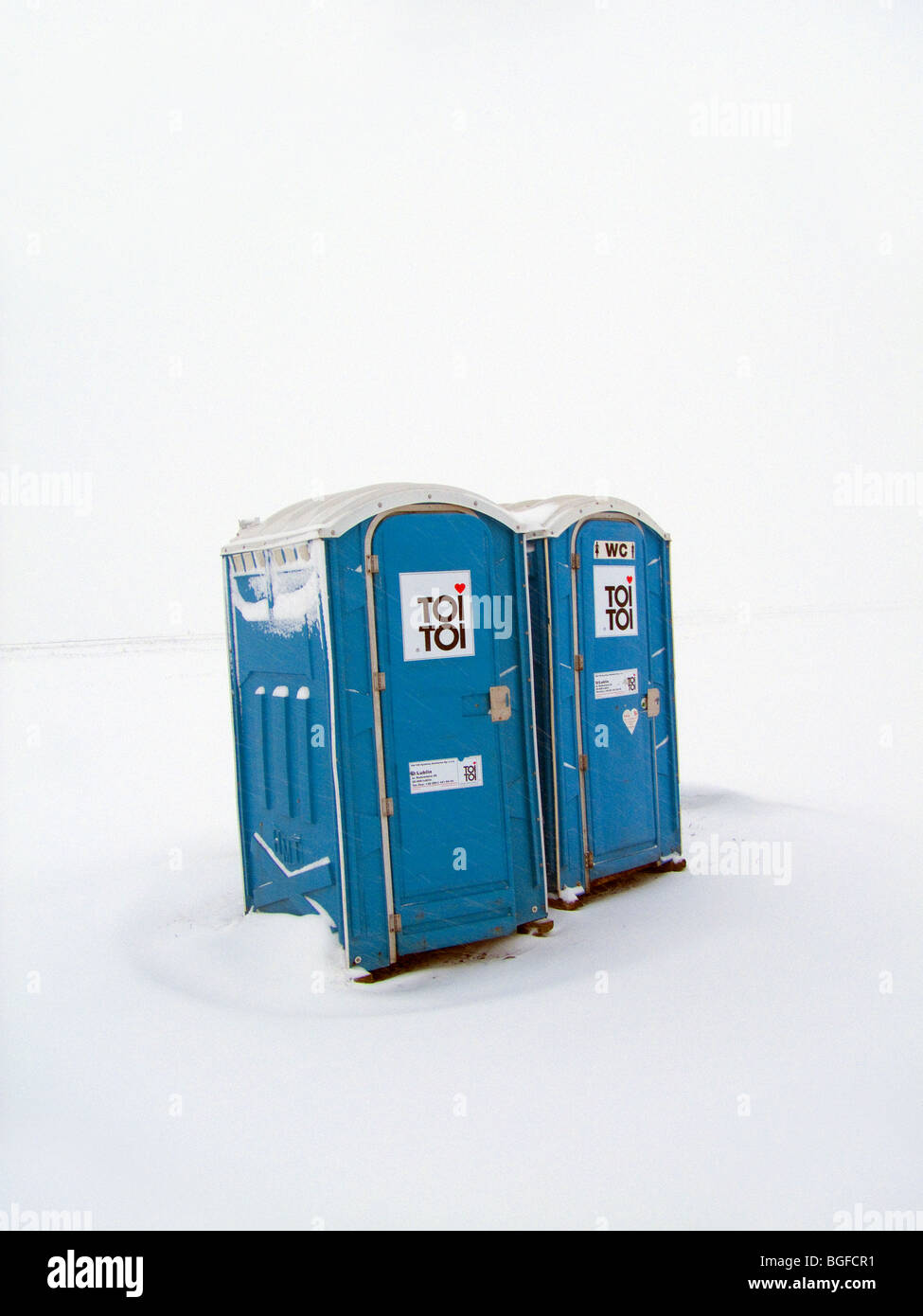 Toi Toi toilet WC in winter snow extreme weather Stock Photo