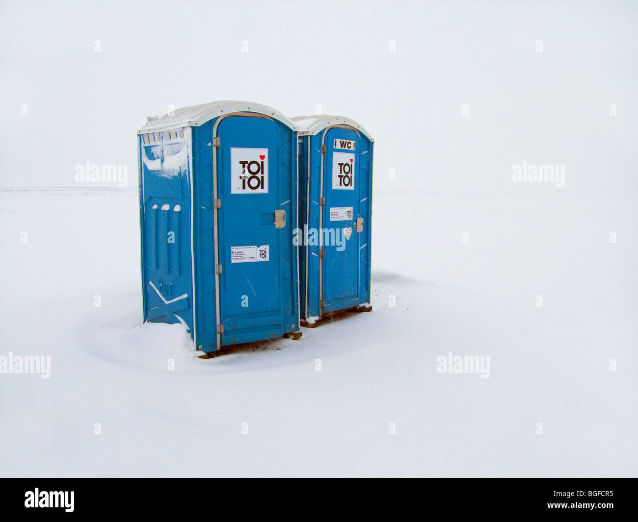 Toi Toi toilet WC in winter snow extreme weather Stock Photo
